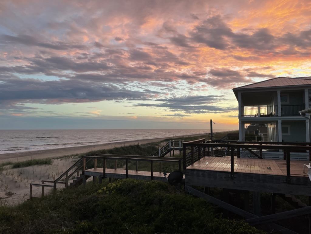 Oak Island at sunset from our beach house.